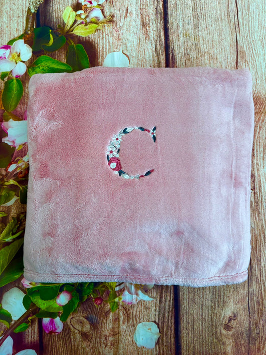 Embroidered fleece blanket