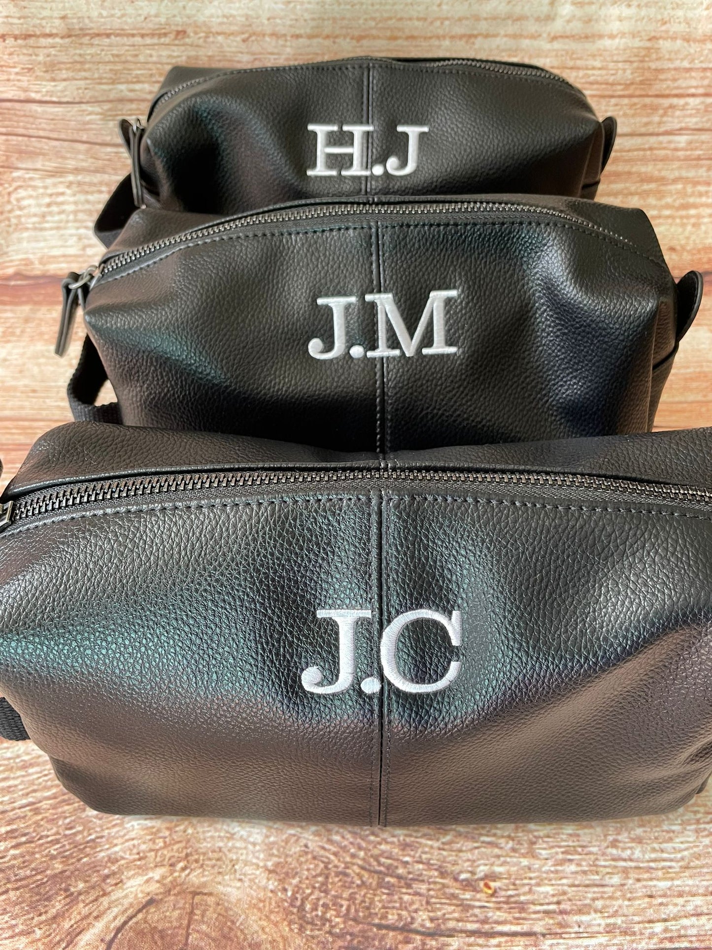 Personalised monogram embroidered wash bag. Leather look, high quality & choice of colours.